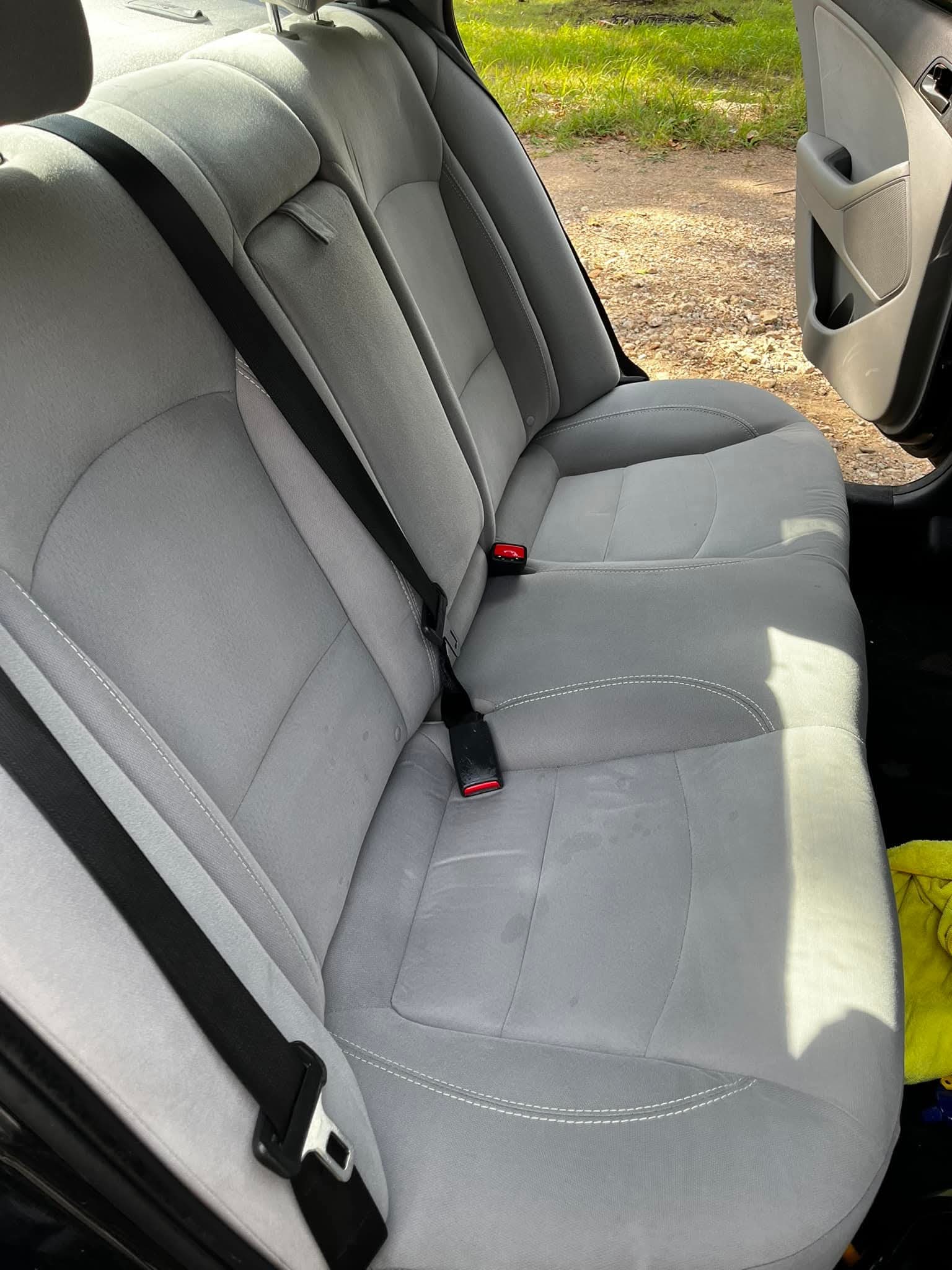 Clean cloth rear seats after interior reset
